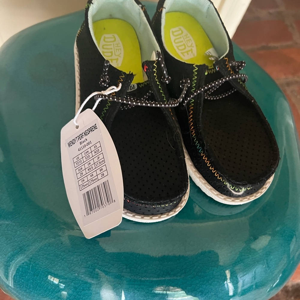 Hey Dude Black Sneakers with Lace-Up Design and White Soles
